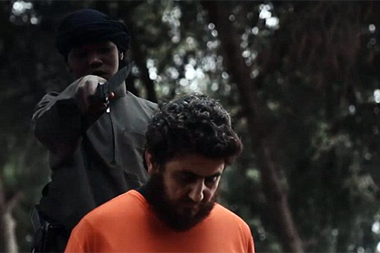 Боевики ИГ опубликовали видео казни заложника малолетним джихадистом