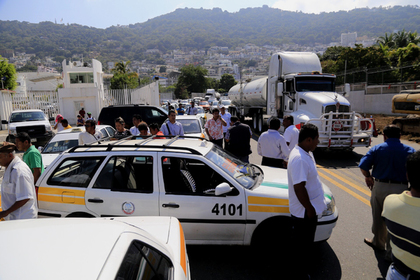 Правительство Мексики призвали ввести полицию в охваченные беспорядками города
