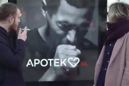 Шведских курильщиков напугали кашляющим рекламным щитом