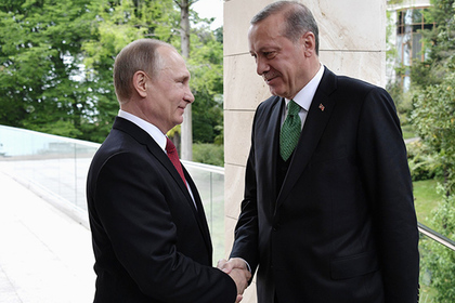 Эрдоган передал Путину совместные фото российских военных и курдов в Сирии