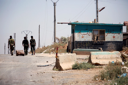 Сирийские боевики сдали властям еще один город