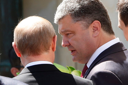 Путин и Порошенко решили урегулировать кризис на Украине мирным путем