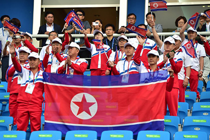 Гражданам Южной Кореи пригрозили арестом за флаги КНДР на Азиатских играх