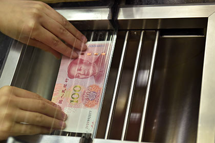 Китай резко поднял курс юаня к доллару