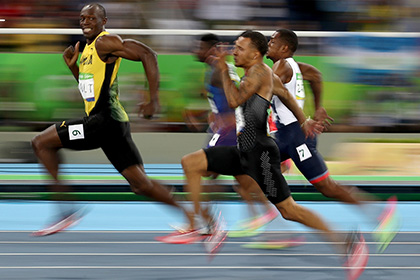 Ямайский бегун Болт улыбнулся в камеру во время стометровки и стал мемом