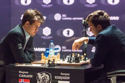 Карякин сыграл вничью с Карлсеном первую партию матча за шахматную корону