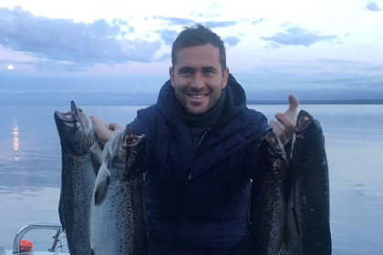 Против Кержакова завели дело за фото с лососями