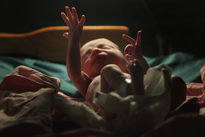 Бомж в США сфотографировал умершую после родов жену с новорожденным и расчленил